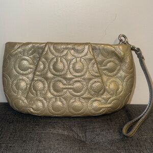 Coach Signature Debossed Gold Patent Leather Wristlet 43229